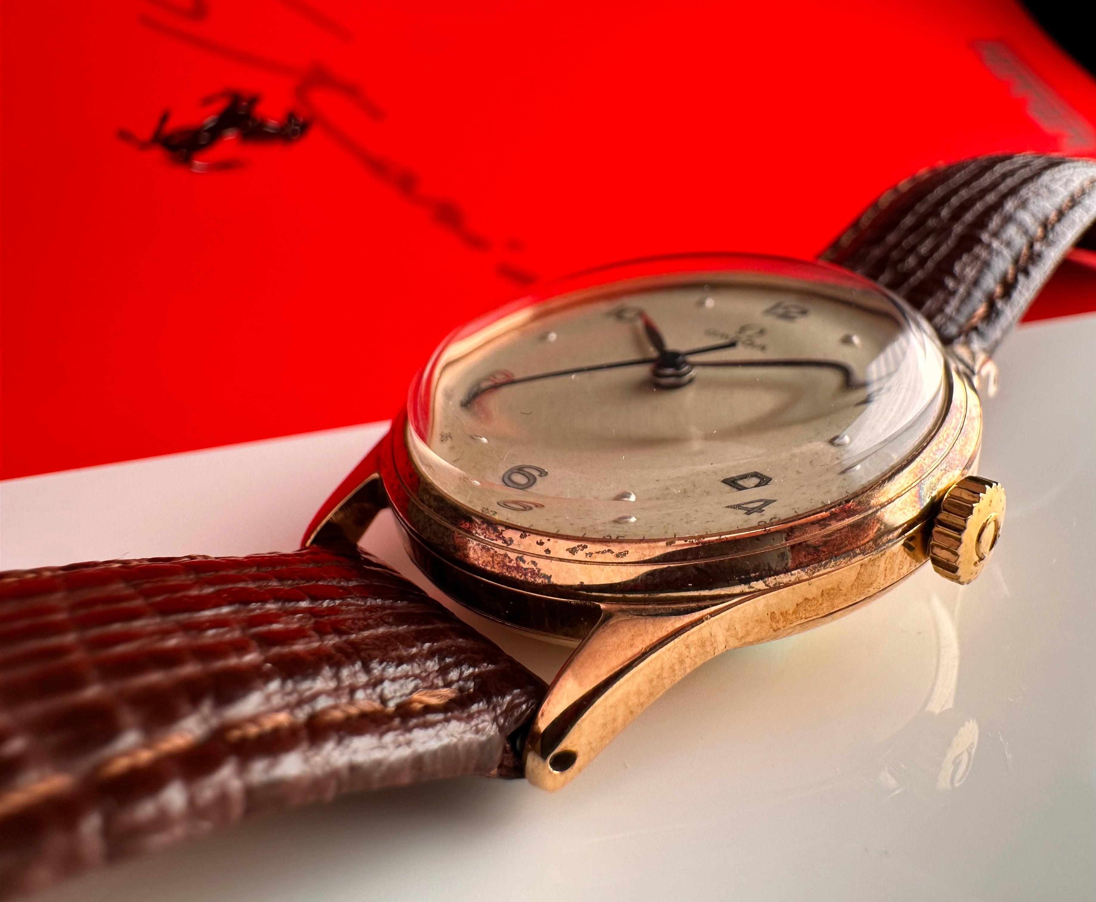 A fine Solid 9ct Gold Gents Omega With Blue Steel Hands From The Early-1950s