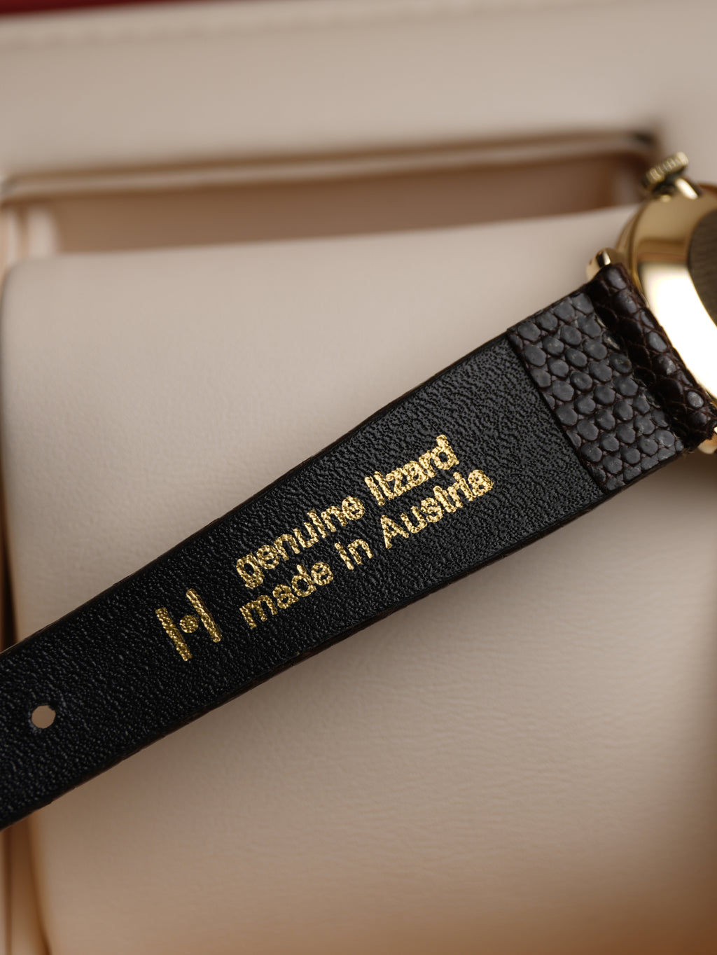 Hirsch genuine lizard strap fitted for Vintage Omega ladies dress watch with silver dial, applied baton hour markers, 9ct solid gold case and brown leather strap, displayed in original Omega presentation box.