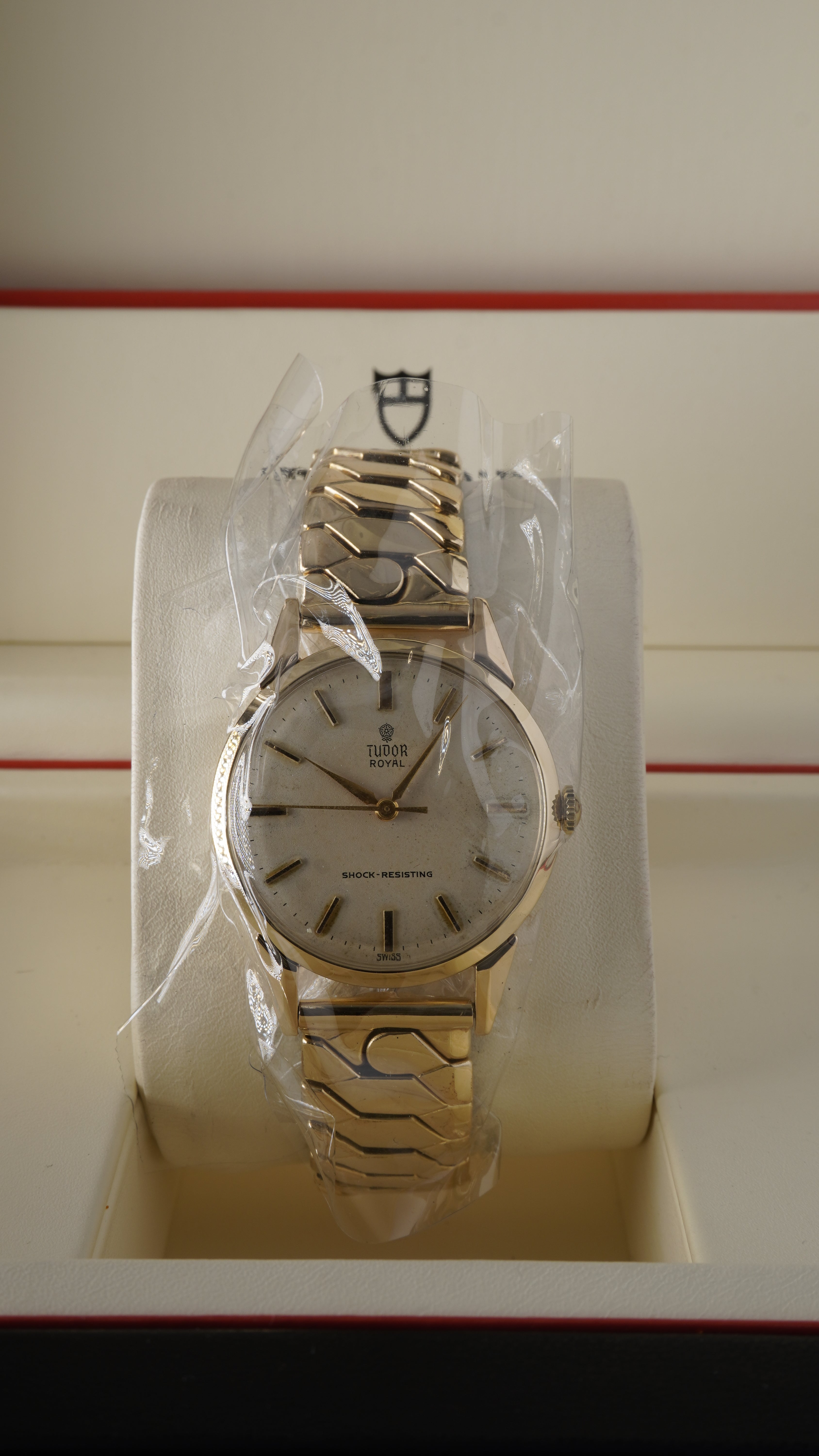 
Close-up of vintage Tudor Royal 9ct gold watch featuring original dial, applied indices, and gold bracelet