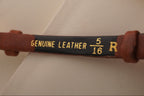 Brown leather belt with 'Genuine Leather' label on a white background