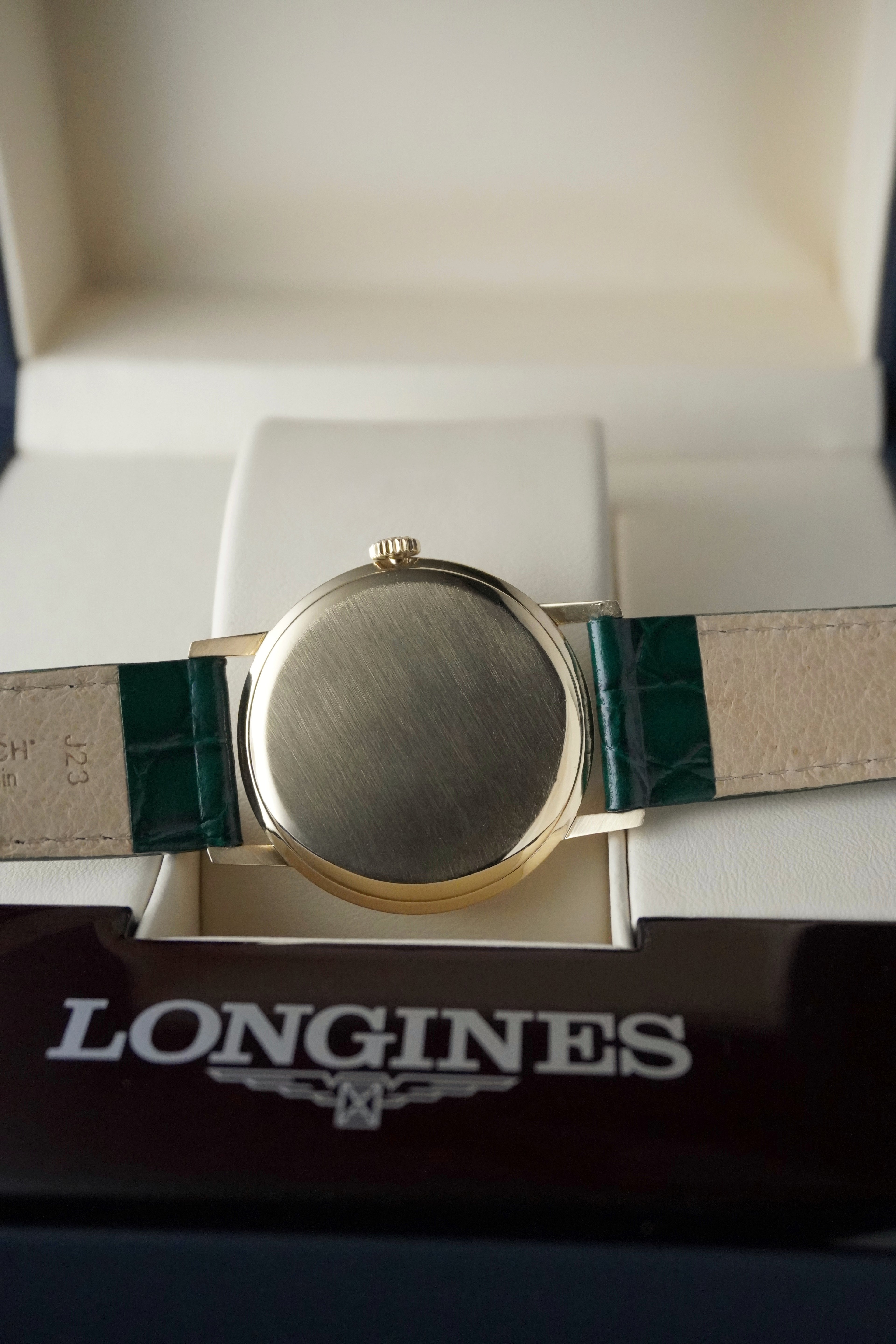 Vintage 9ct Yellow Gold Longines watch with green strap and beige face in Longines Box 